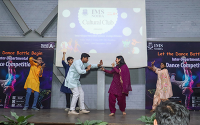 PGDM Student Performance at Inter-Departmental Dance Competition – A Showcase of Talent A student performing a dynamic dance routine at the Inter-Departmental Dance Competition at IMS Noida.