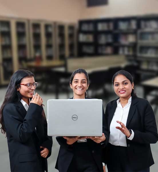 PGDM Program Overview at IMS Noida – Unlock Your Global Career Potential. IMS Noida students reviewing the PGDM program overview on a laptop, exploring global career opportunities.